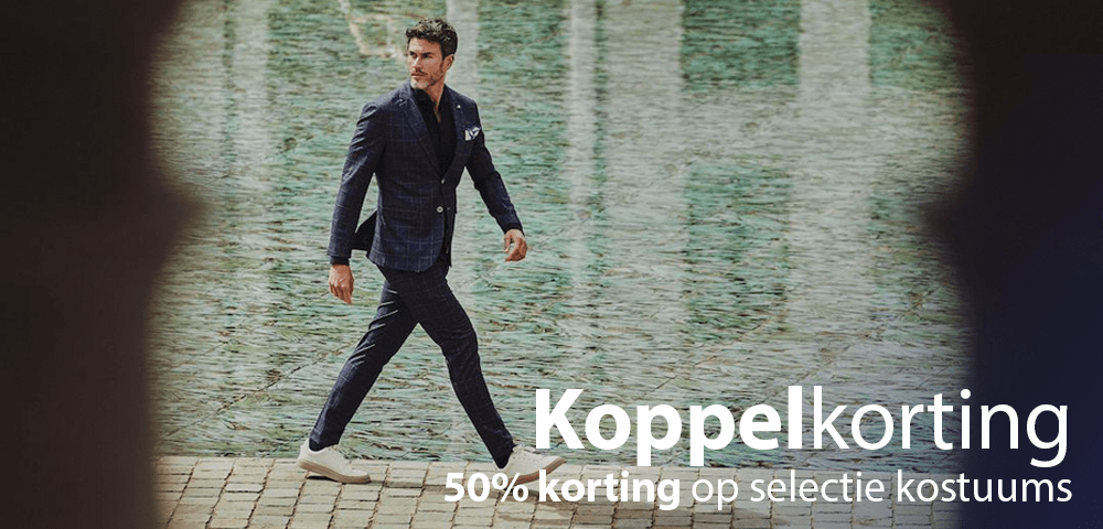 man in kostuum wandelt aan water koppelkorting